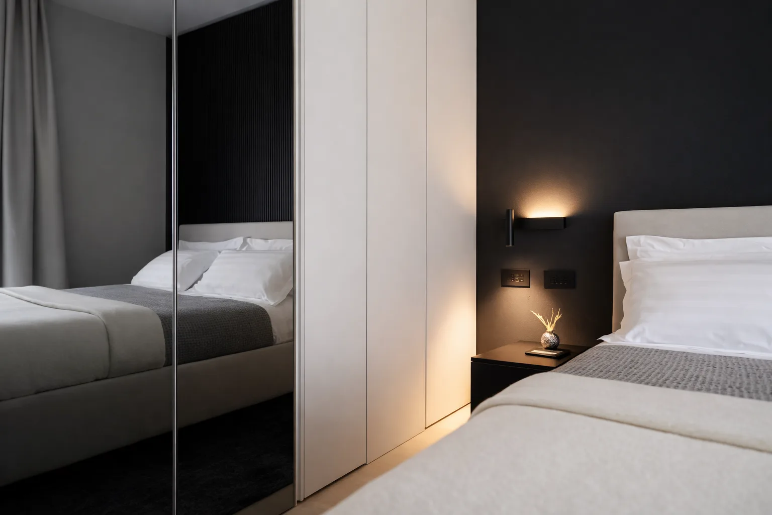 AZULIS Apartments: king-size bedroom with upholstered bed, dark feature wall and wall reading light, Via Pisano 16, Olbia